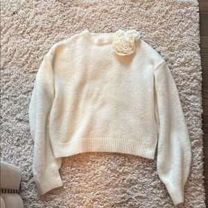 Elegant Cream Sweater with Floral Detail